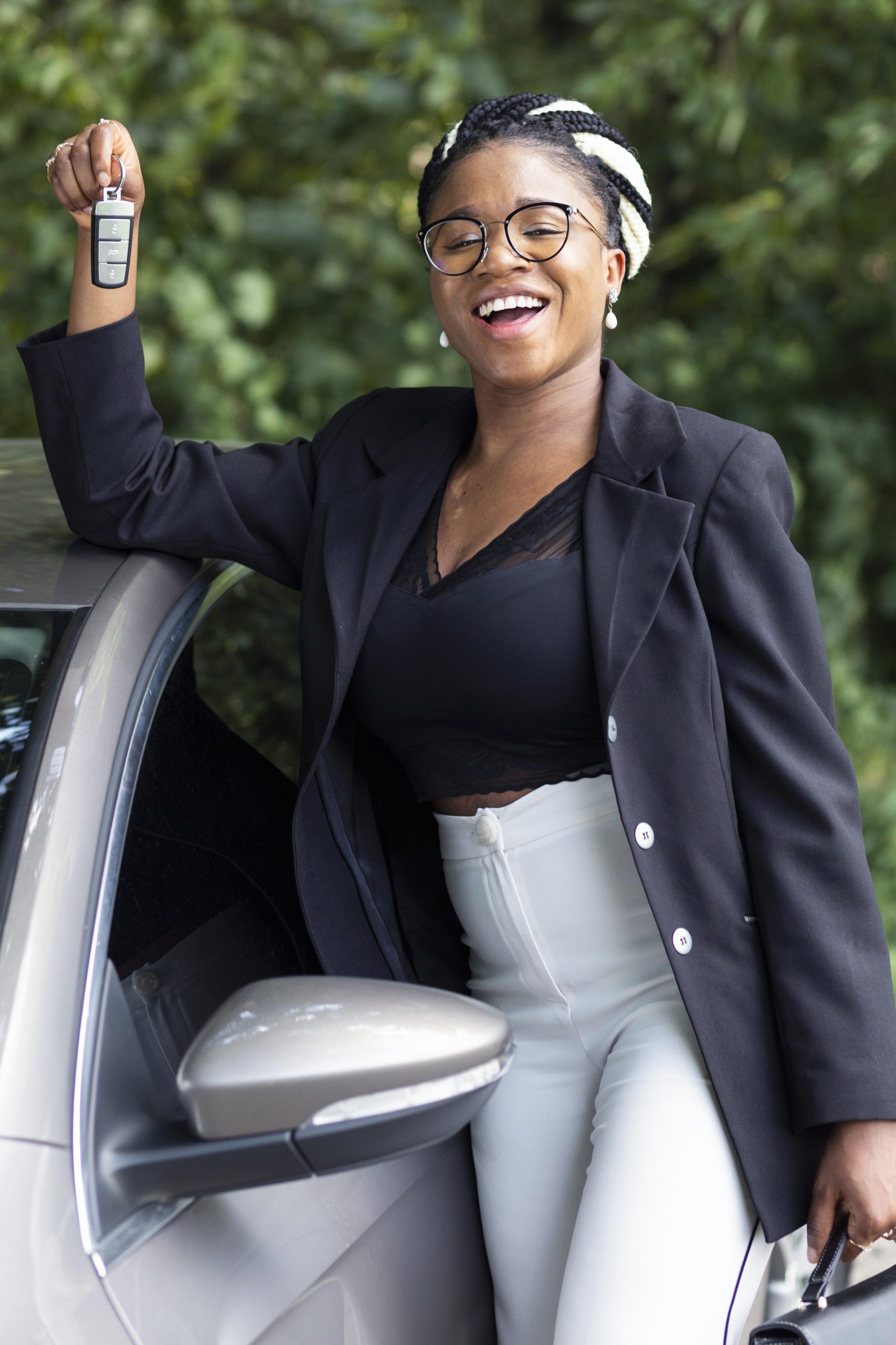 smiley-woman-holding-up-her-car-keys